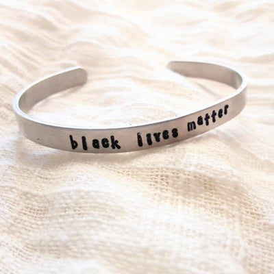 black.lives.matter.silver.cuff.bracelet.hand.stamped.by.women.survivors.sold.at.do.good.shop.ethical.gifts
