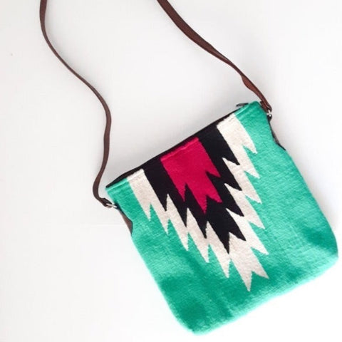 crossbody.purse.handwoven.merino.wool.and.leather.artisan.quality.sold.at.do.good.shop.ethical.gifts.turquoise.ivory.navy.magenta.pink